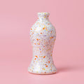 Handmade ceramic oil bottle confetti pattern lifestyle