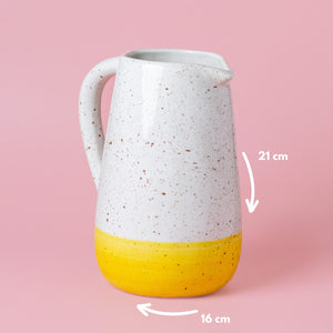 Handmade spotted ceramic jar with wooden lid