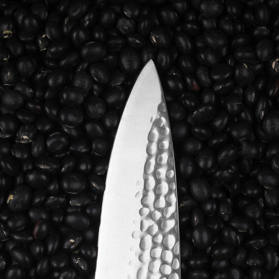 Detail of cherry-wood handle on KOTAI Gyuto chef knife