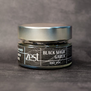 Black Magic black garlic finishing salt in glass jar with ZEST label