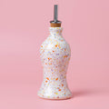 Ceramic oil holder close-up confetti glaze detail