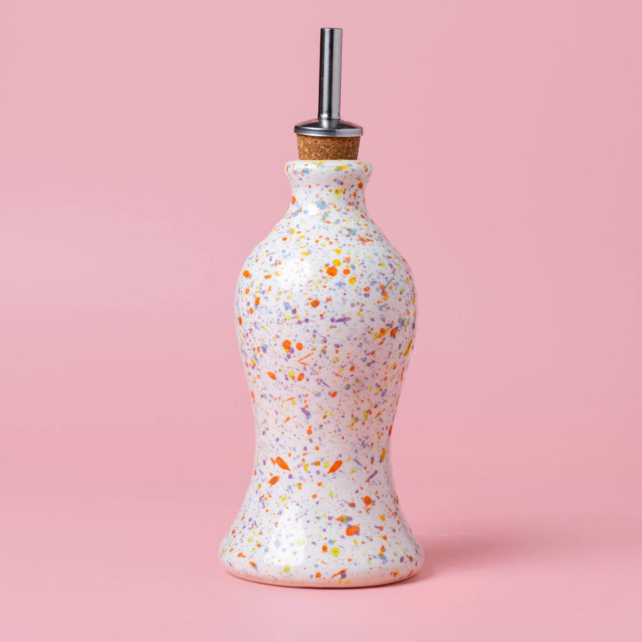 Ceramic oil holder close-up confetti glaze detail