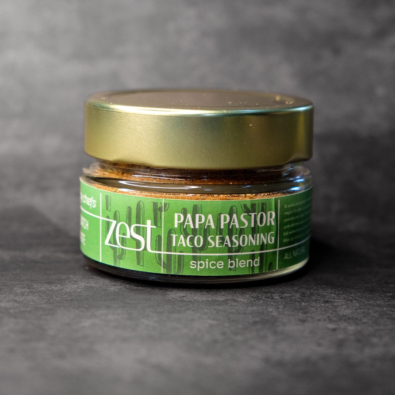 Papa Pastor al pastor taco seasoning in glass jar with ZEST label