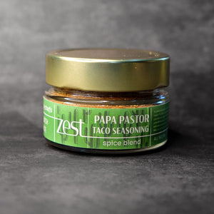 Papa Pastor al pastor taco seasoning in glass jar with ZEST label