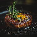 Smokin' Salt finishing a steak with rosemary